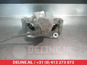 Toyota Auris Bremszange links vorne O325711 foto 2