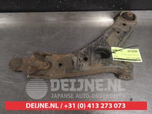 Hyundai IX35 Front lower wishbone, left O381096 photo 2