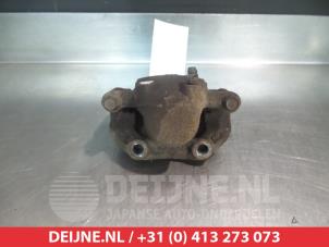 Ssang Yong Rexton Rear brake calliper, left O376357 photo 2