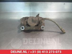 Mitsubishi Pajero Bremszange links hinten O376445 foto 2