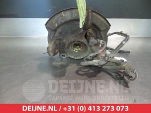 Daihatsu Cuore Fusee links-voor O322978 foto 2