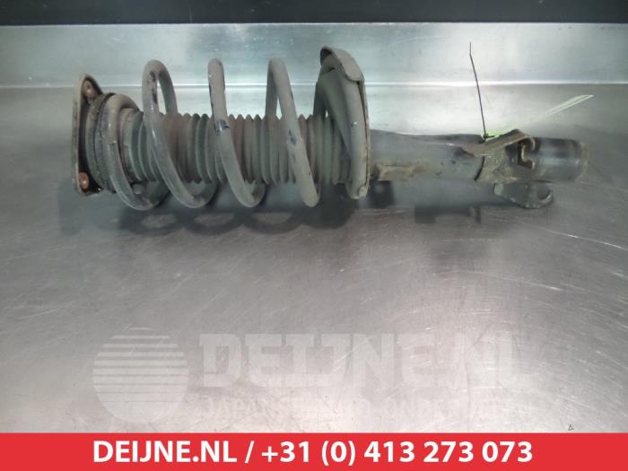 Mazda 3 Schokdemperpoot links-voor O320328