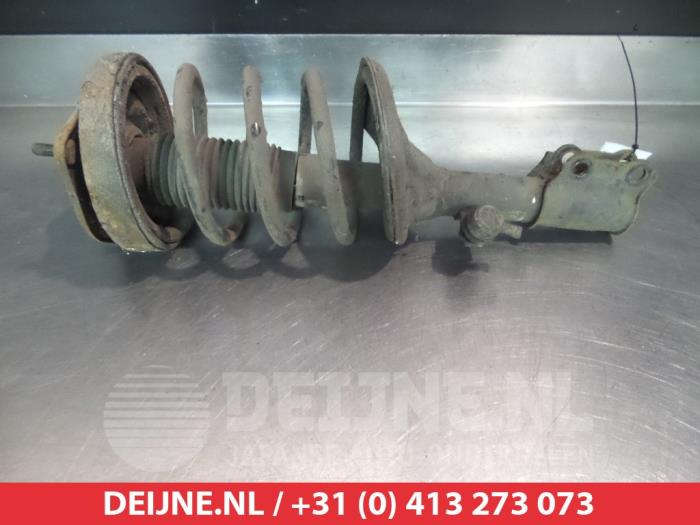 Hyundai Coupe Schokdemperpoot links-voor O320454