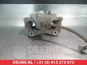 Hyundai Coupe Bremszange rechts vorne O325997 foto 2