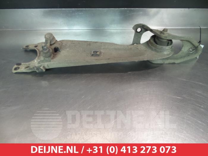 Kia Carnival Draagarm links-achter O383485
