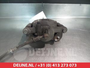 Mazda 2 Front brake calliper, left O324653 photo 2