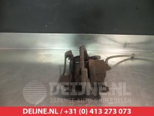 Nissan Qashqai Front brake calliper, left O324912 photo 2
