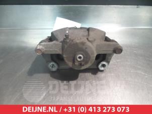 Nissan Qashqai Front brake calliper, left O324914 photo 2