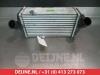 Intercooler van een Kia Rio III (UB), 2011 / 2017 1.1 CRDi VGT 12V, Hatchback, Diesel, 1.120cc, 55kW (75pk), FWD, D3FA, 2011-09 / 2017-12, UBF5D1; UBF5D3; UBF5D5; UBF5D7 2015