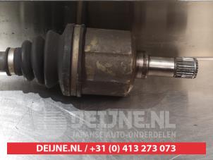 Honda CRX Aandrijfas links-voor O318238 foto 3
