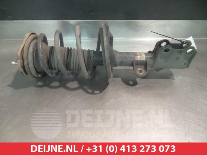 Toyota Avensis Schokdemperpoot links-voor O321083