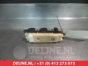 Toyota Avensis Verso Combischakelaar ramen O312453 foto 2