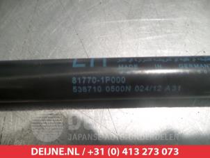Kia Venga Gasdemper links-achter O293942 foto 2