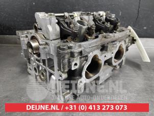Subaru Legacy Cylinder head O352198 photo 2