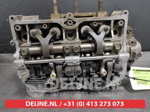 Subaru Legacy Cylinder head O352198 photo 4