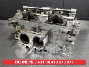 Subaru Legacy Cylinder head O352198 photo 3