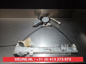 Suzuki Liana Fenstermechanik 4-türig links hinten O290846 foto 2