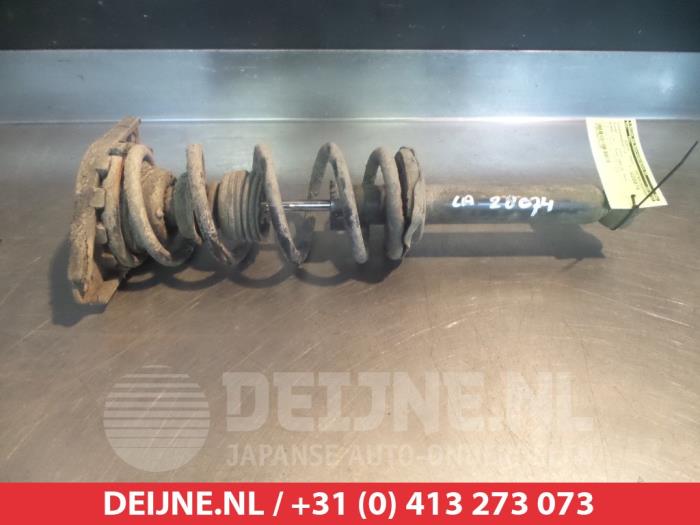 Nissan Almera Tino Schokdemperpoot links-achter O377690