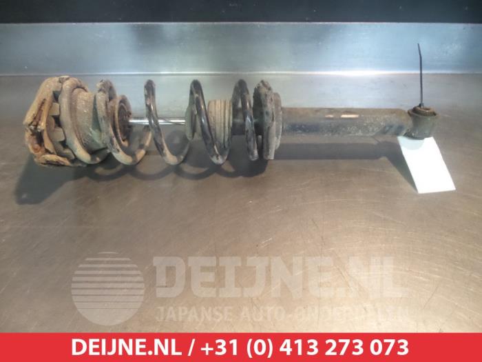 Nissan Almera Tino Schokdemperpoot rechts-achter O377937