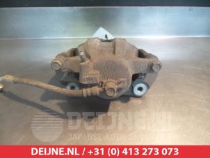 Toyota Verso-S Front brake calliper, left O325760 photo 2