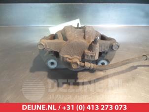 Toyota Verso-S Front brake calliper, right O327050 photo 3