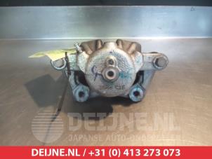 Nissan Note Front brake calliper, left O324815 photo 2