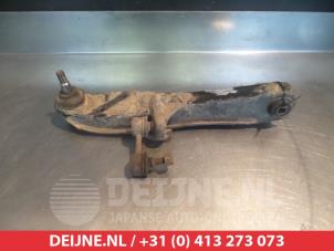 Gebruikte Draagarm onder links-voor Mitsubishi Pajero Pinin (H6/H7) 1.8 GDI 16V 3-drs. Prijs € 35,00 Margeregeling aangeboden door V.Deijne Jap.Auto-onderdelen BV