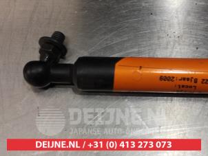 Subaru Justy Gasdämpfer links hinten O293859 foto 2