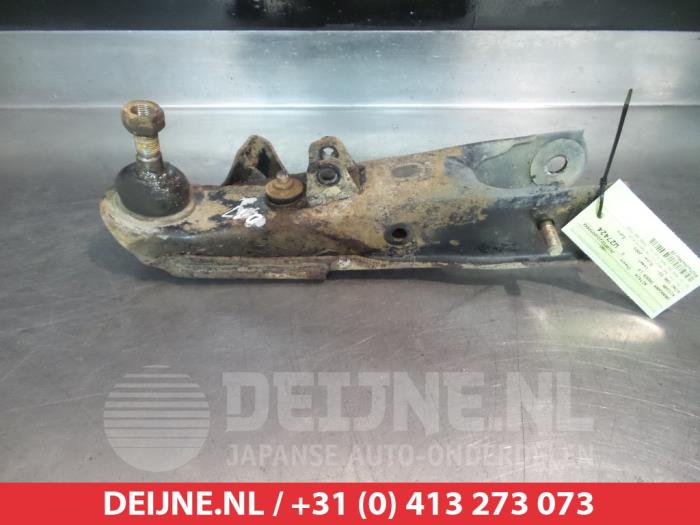 Nissan King Cab Querlenker unten links vorne O381260