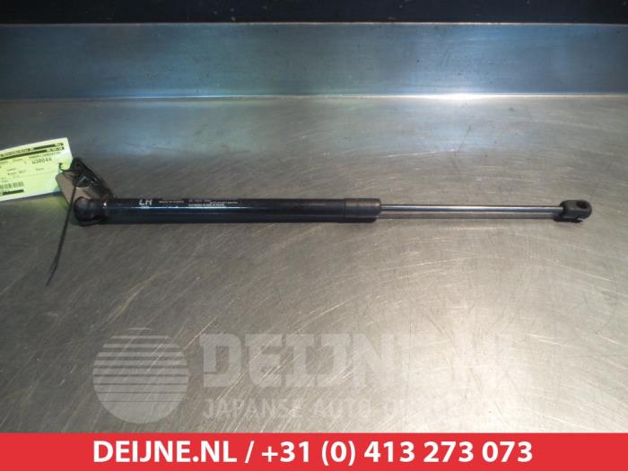 Kia Rio Gasdemper links-achter O294012