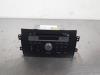 Radio CD Speler van een Suzuki SX4 (EY/GY), 2006 1.6 16V VVT Comfort,Exclusive Autom., SUV, Benzine, 1.586cc, 79kW (107pk), FWD, M16AVVT, 2006-06, EYA21S; GYA21S 2008