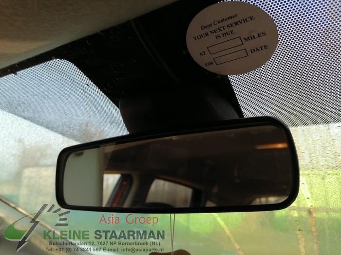 Binnenspiegel van een Nissan Note (E12) 1.2 DIG-S 98 2015