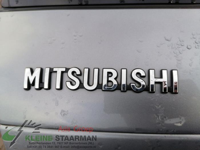 Draagarm boven links-achter van een Mitsubishi Eclipse Cross (GK/GL) 1.5 Turbo 16V 2WD 2019