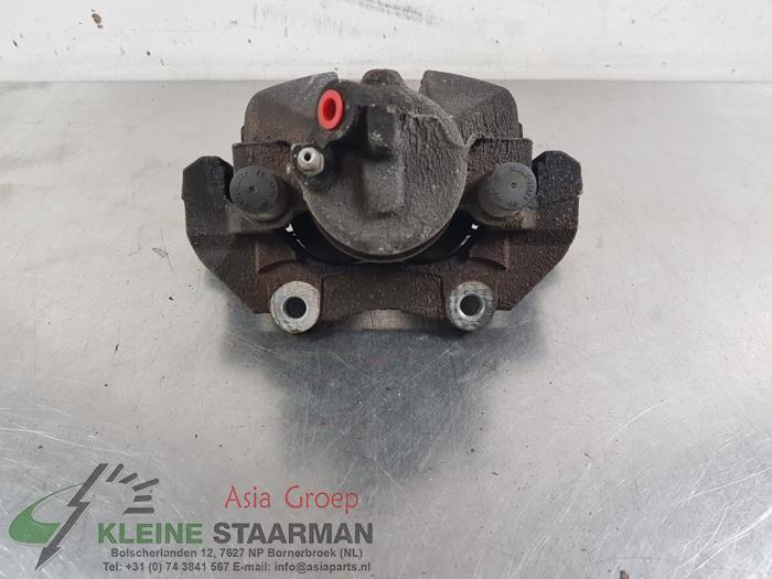 Remklauw (Tang) links-voor van een Mazda 3 Sport (BL14/BLA4/BLB4) 2.0i MZR DISI 16V 2010