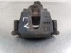 Remklauw (Tang) links-voor van een Mazda 3 Sport (BL14/BLA4/BLB4) 2.0i MZR DISI 16V 2010