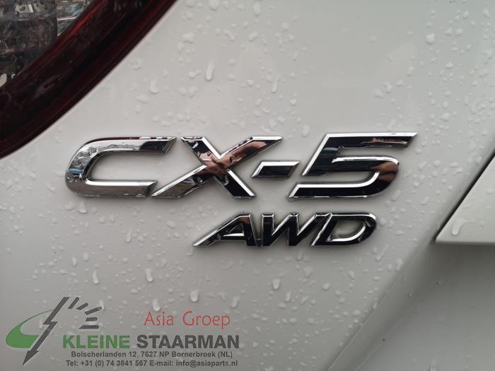 Achterklepdemper rechts-achter van een Mazda CX-5 (KE,GH) 2.2 Skyactiv D 16V High Power 4WD 2016