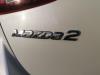 Ruitmechaniek 4Deurs links-achter van een Mazda 2 (DJ/DL), 2014 1.5 SkyActiv-G 90, Hatchback, Benzine, 1.496cc, 66kW, P5Y5; P5Y7; P5Y8, 2014-11 2016
