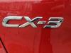Schokdemper links-achter van een Mazda CX-3 2017