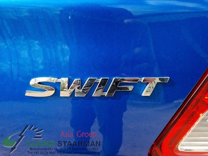 Schokbreker links-achter van een Suzuki Swift (ZC/ZD) 1.0 Booster Jet Turbo 12V 2018