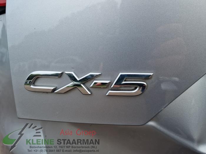 Draagarm onder links-voor van een Mazda CX-5 (KF) 2.2 SkyActiv-D 150 16V 2WD 2019