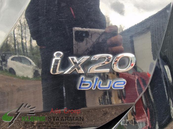 Schokdemper links-achter van een Hyundai iX20 (JC) 1.4i 16V 2014