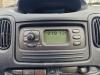 Radio van een Toyota Yaris Verso (P2), 1999 / 2005 1.5 16V, MPV, Benzine, 1.497cc, 78kW (106pk), FWD, 1NZFE, 2000-03 / 2005-09, NCP21 2002