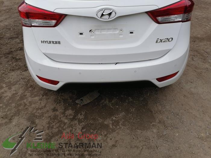 Bumper achter van een Hyundai iX20 (JC) 1.4i 16V 2014
