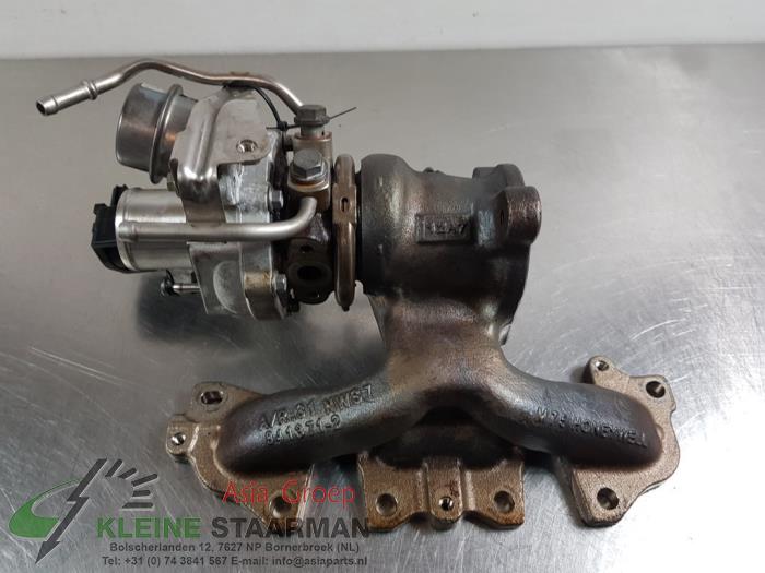 Turbo van een Nissan Qashqai (J11) 1.2 DIG-T 16V 2016