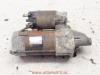 Startmotor van een Daihatsu Cuore (L251/271/276), 2003 1.0 12V, Hatchback, Benzine, 989cc, 40kW, FWD, EJDE, 1998-10 / 2003-05, L701 1999