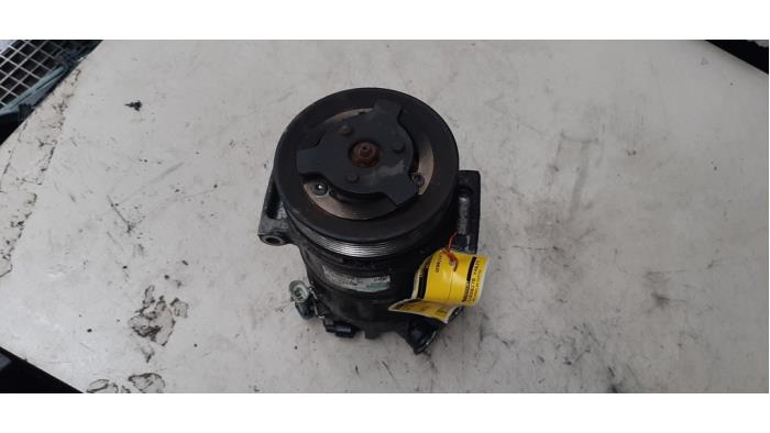 Aircopomp van een Opel Insignia 2.0 CDTI 16V 130 Ecotec 2010