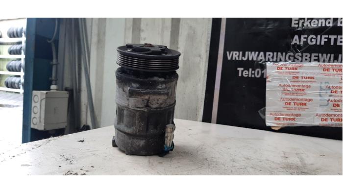 Aircopomp van een Opel Insignia 2.0 CDTI 16V 130 Ecotec 2010