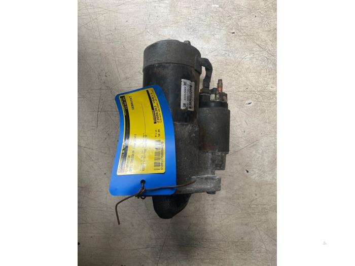 Startmotor van een Opel Insignia Sports Tourer 2.0 CDTI 16V 130 ecoFLEX 2011