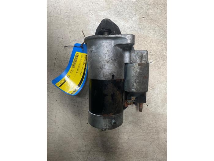 Startmotor van een Opel Insignia Sports Tourer 2.0 CDTI 16V 130 ecoFLEX 2011