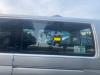 Ruit Laaddeur zijkant van een Volkswagen Transporter T5 2.0 TDI DRF 2012